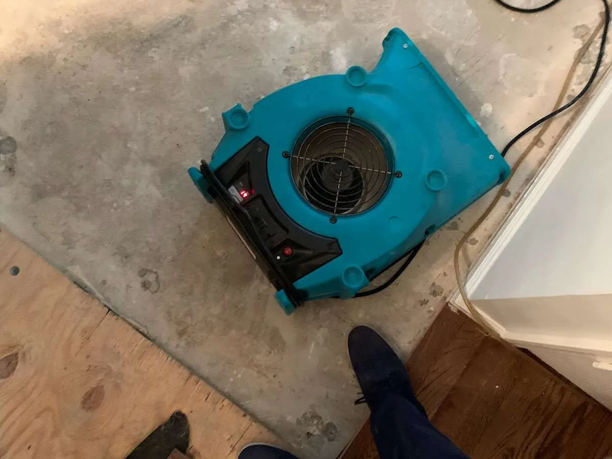 Air mover drying subfloor during Leak Detection & Repair in Rocky River